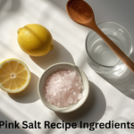 Pink Himalayan salt with lemon and warm water ingredients for morning hydration drink